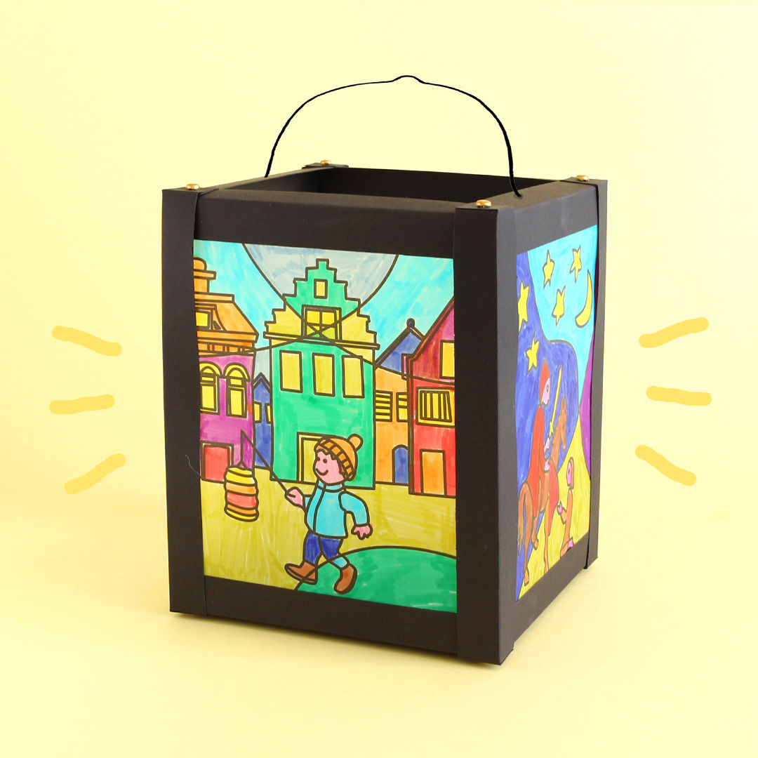 Schwarze Karton-Laterne mit bunten St. Martin Motiven im Pop-Art Stil gestaltet
