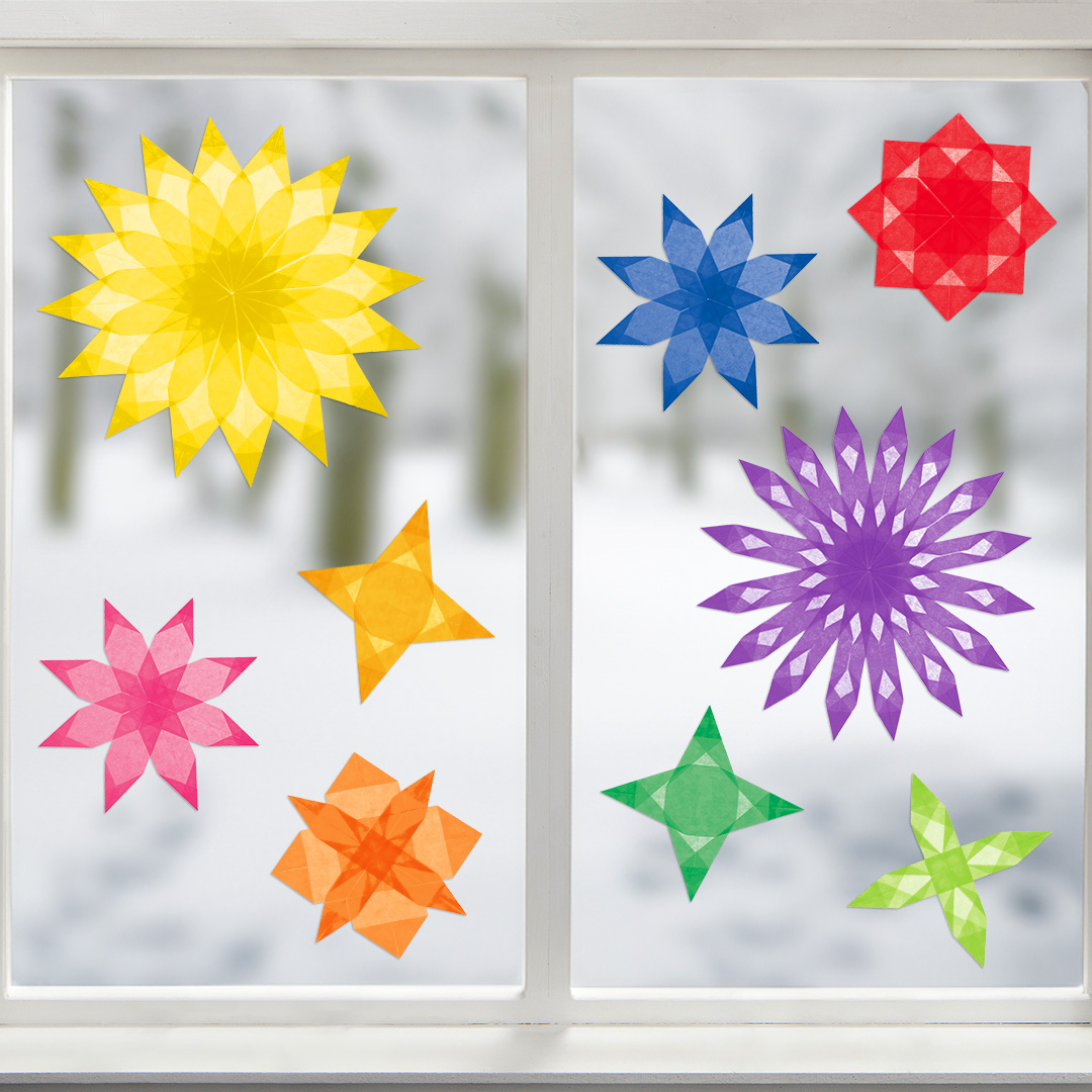 Bunte Fenstersterne im Fenster