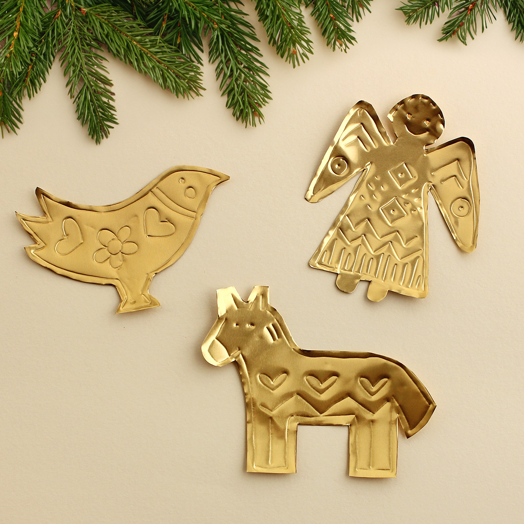Jul-Weihnachtsfiguren aus goldener Prägefolie